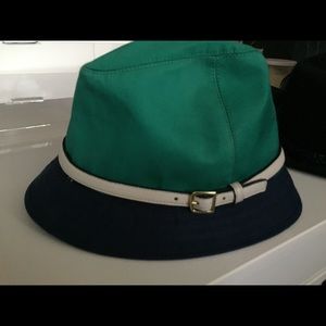 I have two new hats from Coach. Each $375 CAD.